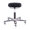Synetik Omnistool welding stool with black round seat, industrial steel base and five rubber casters.