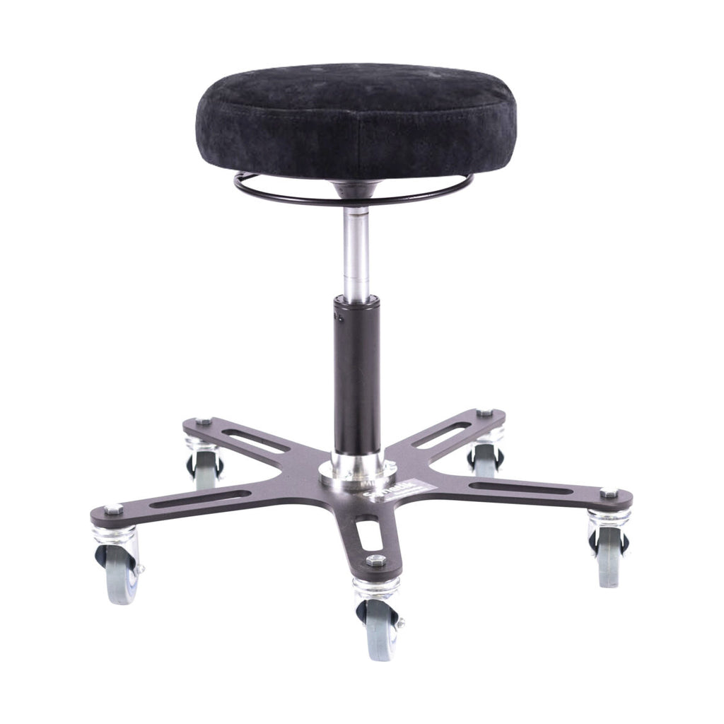 Synetik Omnistool welding stool with black round seat, industrial steel base and five rubber casters.