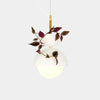 Suspension végétale lumineuse ByNature en double dôme blanc et laiton avec plante tradescantia au feuillage pourpre et vert