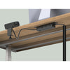 Black Workstation Power Combo installed on a desk with a coiled power cord