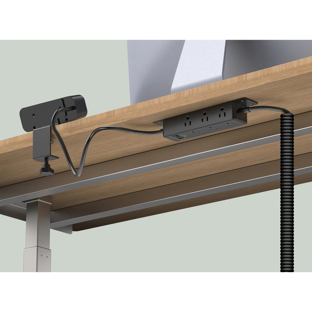 Black Workstation Power Combo installed on a desk with a coiled power cord